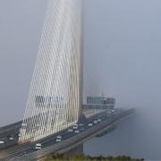 A contrast in weather created by the better temperatures formed a wall of fog in the middle of the bridge