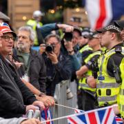 Police and 'pro-UK' protesters facing each other during the Glasgow rally on September 7