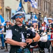 People take part in a Believe in Scotland march and rally in Edinburgh in September 2023