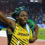 Usain Bolt celebrates with the Glasgow Commonwealth Games crowd in 2014