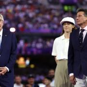 Thomas Bach, left, and Sebastian Coe keep their distance at the closing ceremony of the Olympics in Paris