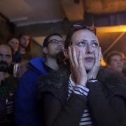 Voters watch the results coming at the Forest Cafe on the night of the Scottish independence referendum.