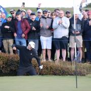 Rasmus Hojgaard holed out from a bunker on the 17th on his way to winning the Irish Open (Peter Morrison/PA)