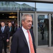 Leader of Reform UK Nigel Farage arrives at the party's annual conference at the National Exhibition Centre in Birmingham