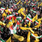 TEHRAN, IRAN - OCTOBER 02: People gather in Imam Hossein Square to support their country's missile strikes against Israel and to commemorate Hezbollah leader Hassan Nasrallah, who was killed in an Israeli airstrike on Beirut, Iranian Brigadier