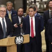 Prime Minister Keir Starmer (left) speaks as Chancellor of the Exchequer Rachel Reeves (right) and Energy Security and Net Zero Secretary Ed Miliband listen during a visit to a manufacturing facility in Chester