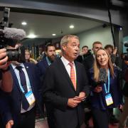 Leader of Reform UK Nigel Farage arrives at the party's annual conference