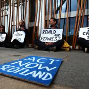 Members of Extinction Rebellion climate protest chain themselves to the Scottish parliament  at Holyrood tuesday..Pic Gordon Terris/The Herald.4/5/19.