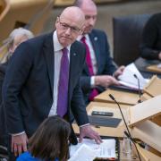 First Minister of Scotland John Swinney during First Minister's Questions at the Scottish Parliament