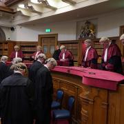 Lord Carloway presides over a proceedings where Sheriff Principal Craig Turnbull(R) is installed as a Senator of the College of Justice during a ceremony in Court 1 at Parliament House, Edinburgh