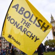 Protesters hold an 'abolish the monarchy' banner as anti-monarchy group Republic stage a protest in Parliament Square on Budget Day