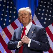 President-elect Donald Trump arrives to speak at a meeting of the House GOP conference