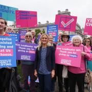 Labour MP Kim Leadbeater (centre) joins as Dignity in Dying campaigners gather in Parliament Square, central London, in support of the 