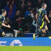 Scotland’s John McGinn (right) celebrates his winner (Jane Barlow/PA)