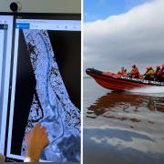 Professor Malcolm Macdonald and the university team with the map generated by satellite data