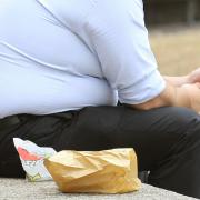 A man eating fast food