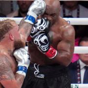 Mike Tyson (right) was defeated by Jake Paul on Friday night (Julio Cortez/AP)