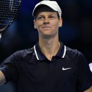 Jannik Sinner (pictured) was all smiles after beating Casper Ruud (Antonio Calanni/AP)