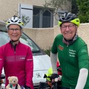 Anne and Graham Bryce photographed during their 2400-mile cycle from Glasgow to the Palestine border