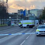 Specialist officers and a robot were pictured at the city centre travel hub