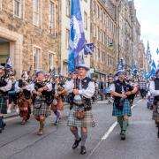 People take part in a Believe in Scotland march and rally in Edinburgh in 2023