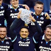 Scotland's Sione Tuipulotu with the Hopetoun Cup trophy