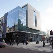 The managing company of St Enoch shopping centre has agreed a new lease with Next