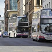 Generic photo of a bus in Glasgow city centre