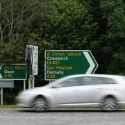 Bi-lingual (in Gaelic and English) road signs on the A85 near Dalmally, Argyll and Bute..... Photograph by Colin Mearns..10 July 2012.