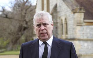 Prince Andrew was seen driving a car with emergency blue lights fitted to it despite being stripped of police protection