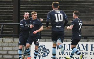 Morton's Gavin Reilly (second from left) celebrates with his team-mates