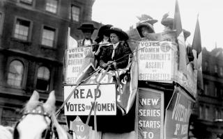 File photo from 1910 of the Women's Social and Political Union (WSPU) on a horse-drawn carriage driven by Emmeline Pankhurst.