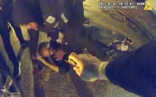 The footage showed the 29-year-old being held down and savagely beaten by the police officers