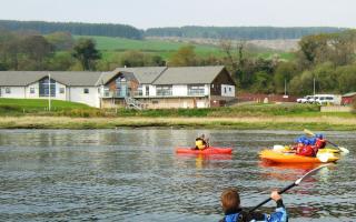 Kayakers will join a peaceful march from the water to the Arran Outdoor Education Centre