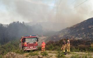 Scores of firefighters were drafted in to tackle the Cannich wildfire last summer