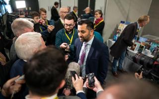 First Minister Humza Yousaf speaks to the media on day two of the SNP conference in Aberdeen