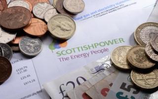 A letter from Scottish Power surrounded by money