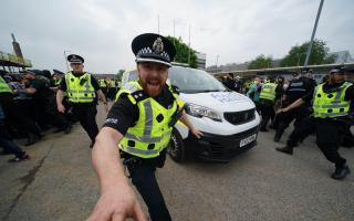 Pro-Palestine protestors and police clash outside Thales factory in Govan, Glasgow