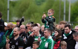Celtic supporters photographed before a premiership match at Celtic Park in May