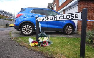 Floral tributes have been left near the home of the Hunt family