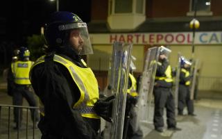 Police officers on the streets of Hartlepool following a violent riot.