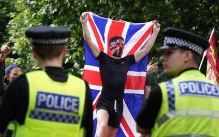 People protest outside Leeds Town Hall in a far-right rally following the stabbing attacks in Southport