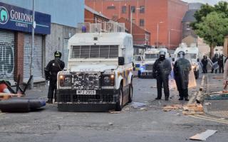 PSNI officers man road blocks in Belfast following an anti-Islamic protest outside Belfast City Hall on August 3