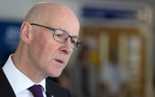 John Swinney responded after plans suggested the UK Government would ban smoking in outdoor spaces