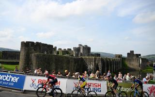 The Tour of Britain will start in Kelso on Tuesday. Shown: the race passing Caerphilly Castle in Wales