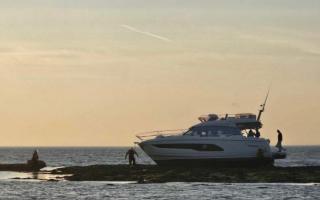 The casualty vessel remained on the rocks for recovery once passengers were rescued.