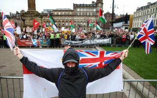 Supporters of a 'pro-UK' rally endorsed by Tommy Robinson gathered in George Square on Saturday