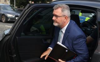 Former DUP leader Sir Jeffrey Donaldson arriving for an arraignment hearing at Newry Court