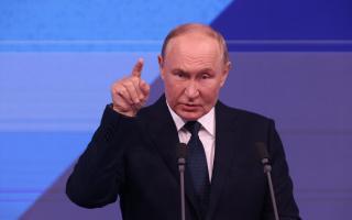 Vladimir Putin gestures during his speech at  Zaryadye Hall, marking the City Day, September 7, 2024, in Moscow, Russia.