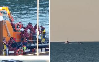 People are seen arriving in the UK at Dover after crossing the Channel on Saturday, and the view from a Calais beach as one boat was approached by French services